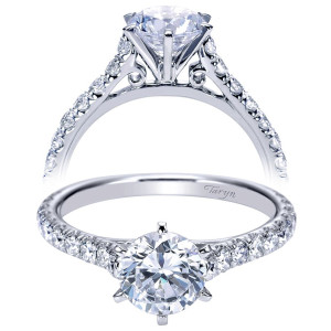 Taryn TE7430W44JJ 14 karat white gold engagement ring, front view of a round solitaire center above a pave shank with scrolled openwork under the head