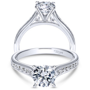 Taryn TE7437W44JJ 14 karat white gold engagement ring, front view of a round center on a tapered shank with graduated shoulder stones and scroll curls
