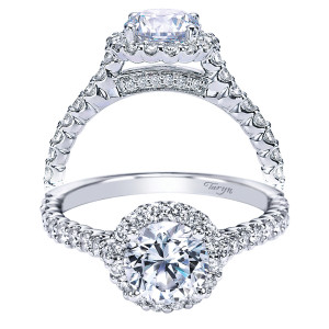 Taryn TE7491W44JJ 14 karat white gold engagement ring, front view of a round center in a single halo above a shared prong pave shank