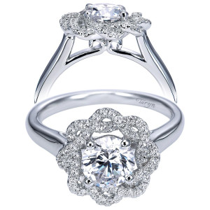 Taryn TE7728W44JJ 14 karat white gold engagement ring, front view of a round center inside an interwoven floral pave halo above a polished parted shank