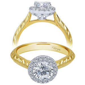 Taryn TE7829M44JJ 14 karat yellow gold engagement ring, front view of a round center in a snug halo above a hand engraved milgrain edged shank