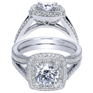 Taryn TE8173W44JJ 14 karat white gold engagement ring, front view of a round center in a squared double halo edged with milgrain above split pave arms