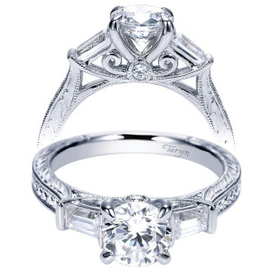 Taryn TE8798W44JJ 14 karat white gold engagement ring, front and profile views of a round center between tapered baguettes above a scrolled gallery with engraving