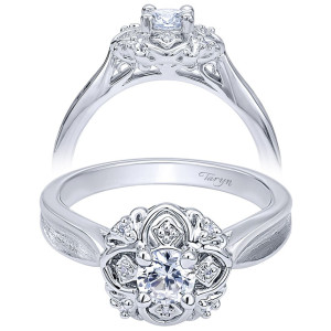 Taryn TE910091W44JJ 14 karat white gold engagement ring, angled and profile views of a round center inside a floral scrollwork frame set with tiny accents