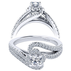 Taryn TE910142W44JJ 14 karat white gold engagement ring, angled and profile views of a small halo caught in looping pave swirls over an open bypass shank