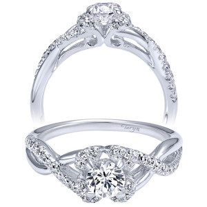 Taryn TE910155W44JJ 14 karat white gold engagement ring, angled and profile views of a round halo where a pave arm twists across a polished arm
