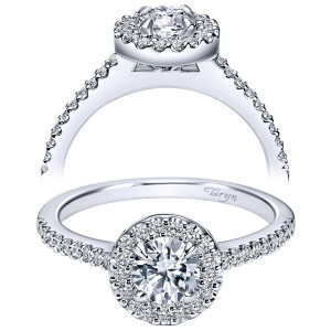 Taryn TE95416W44JJ 14 karat white gold engagement ring, front and profile views of a round center in a scalloped halo above a slender pave shank