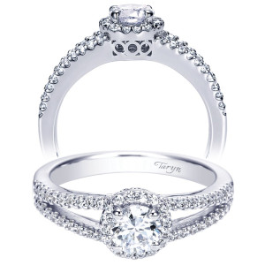 Taryn TE96414W44JJ 14 karat white gold engagement ring, angled view of a round center in a scalloped halo above a split shank with pierced gallery