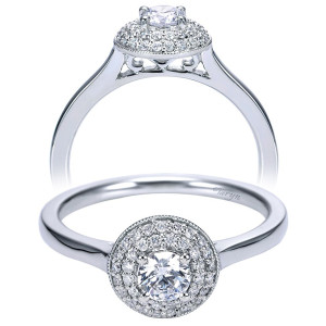 Taryn TE97766W44JJ 14 karat white gold engagement ring, angled view of a round center in a milgrain edged double halo on a plain shank