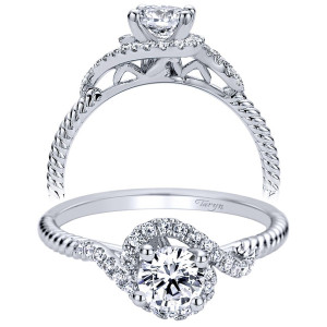 Taryn TE98142W44JJ 14 karat white gold engagement ring, angled view of a round center in a swirl halo on a rope twisted shank