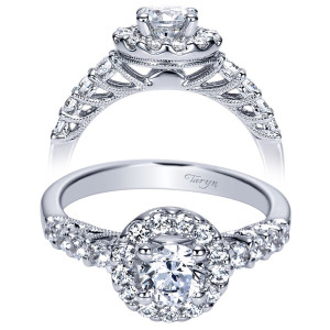 Taryn TE98150W44JJ 14 karat white gold engagement ring, angled view of a round center in a halo of larger rounds above graduated shoulder stones
