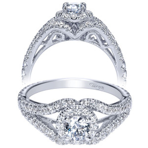 Taryn TE98506W44JJ 14 karat white gold engagement ring, front view of a round center in a halo with crossing pave rails and filigree scrollwork