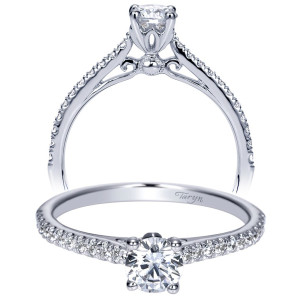 Taryn TE98509W44JJ 14 karat white gold engagement ring, front view of a prong set round center above a filigree collar and tapered pave rails