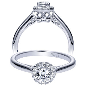 Taryn TE98561W44JJ 14 karat white gold engagement ring, front view of a round center in a halo raised on a scrolled collar, plain shank