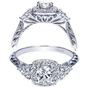 Taryn TE98659W44JJ 14 karat white gold engagement ring, front and profile views of a round center in a squared halo with graduated side stones and engraving