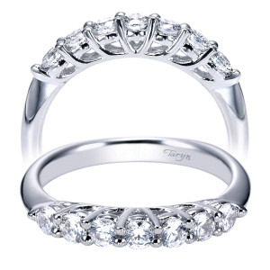 Taryn TW3957W44JJ 14 karat white gold wedding band, front view of seven rounds in shared prongs arching above a plain tapered shank