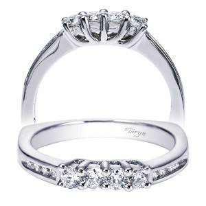 Taryn TW5418W44JJ 14 karat white gold wedding band, row of larger shared prong rounds centered above channel set rounds along each shoulder