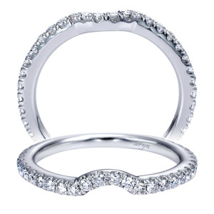Taryn TW6971W44JJ 14 karat white gold wedding band, front and upright views of a dipped contour whose prong set row reaches nearly around the rim