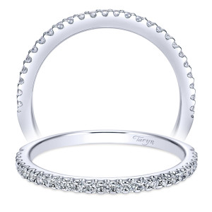 Taryn TW7227W44JJ 14 karat white gold wedding band, front and upright views of a continuous row of prong set rounds spanning more than half the rim