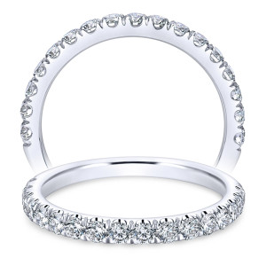 Taryn TW7292W44JJ 14 karat white gold wedding band, standing and tilted views of broad shared prong rounds set high in a scalloped row
