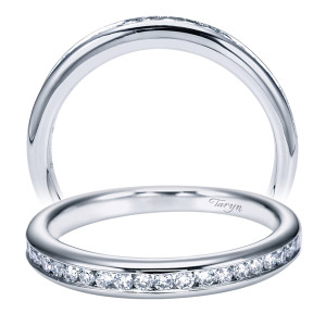 Taryn TW7437W44JJ 14 karat white gold wedding band, upright and tilted views of a channel set row sunk below a domed polished surface