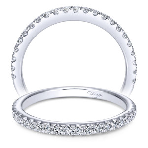 Taryn TW7460W44JJ 14 karat white gold wedding band, upright and tilted views of pave rounds running halfway around a slim tapered shank
