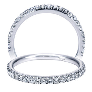 Taryn TW7461W44JJ 14 karat white gold wedding band, upright and tilted views of a closely set pave row extending well past the shoulders with scalloped edges