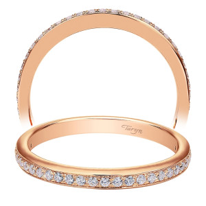 Taryn TW7537K44JJ 14 karat rose gold wedding band, slim tapering profile with a bead set round stone row hugging the outer rim