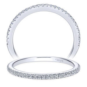 Taryn TW7786W44JJ 14 karat white gold wedding band, front views of one delicate row of pave rounds carried past the halfway point