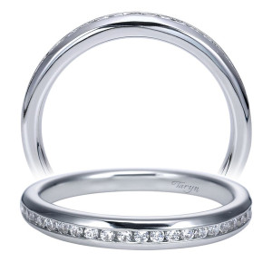 Taryn TW8195W44JJ 14 karat white gold wedding band, front view of channel set rounds curving below a rounded polished stripe that tapers rearward