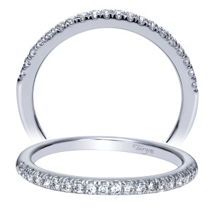 Taryn TW8556W44JJ 14 karat white gold wedding band, two views of a straight row of shared prong stones tapering smaller toward the flat shoulders