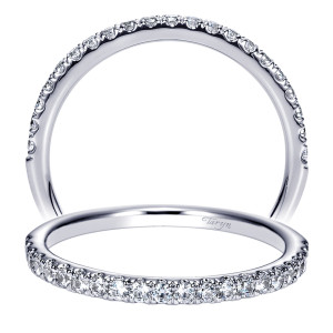 Taryn TW8849W44JJ 14 karat white gold wedding band, two views of a single shared prong stone row running partway around a plain rim