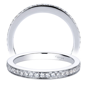 Taryn TW9364W44JJ 14 karat white gold wedding band, angled view of a shallow set stone line inside raised milgrain rims, plain toward the back