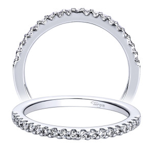 Taryn TW9377W44JJ 14 karat white gold wedding band, angled view of tiny evenly spaced rounds in shared prongs above a plain rounded rear