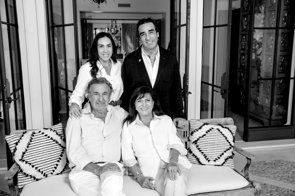 The Tacorian family photographed together in black and white.