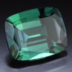 A cushion-cut alexandrite, green in daylight